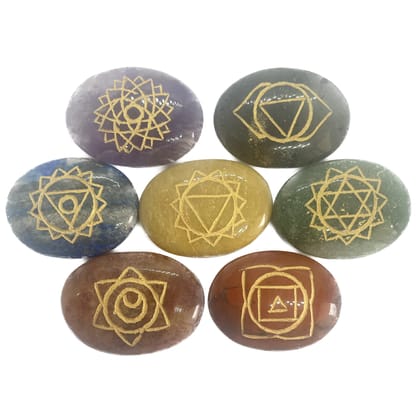 KITREE ENERGISED NATURAL CARVING SEVEN CHAKRAS CRYSTAL COINS STONE WITH POUCH (MULTI COLOR) KITREE ENERGISED NATURAL CARVING SEVEN CHAKRAS CRYSTAL COINS STONE WITH POUCH (MULTI COLOR)