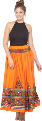 Vibrant-Orange Ghagra Skirt from Kutch with Multicolor Thread Embroidered Patch Border and Mirrors Vibrant-Orange Ghagra Skirt from Kutch with Multicolor Thread Embroidered Patch Border and Mirrors