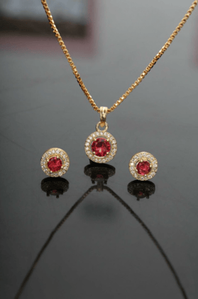 Golden plated cz Red colour round pendant set for girls & women Golden plated cz Red colour round pendant set for girls & women