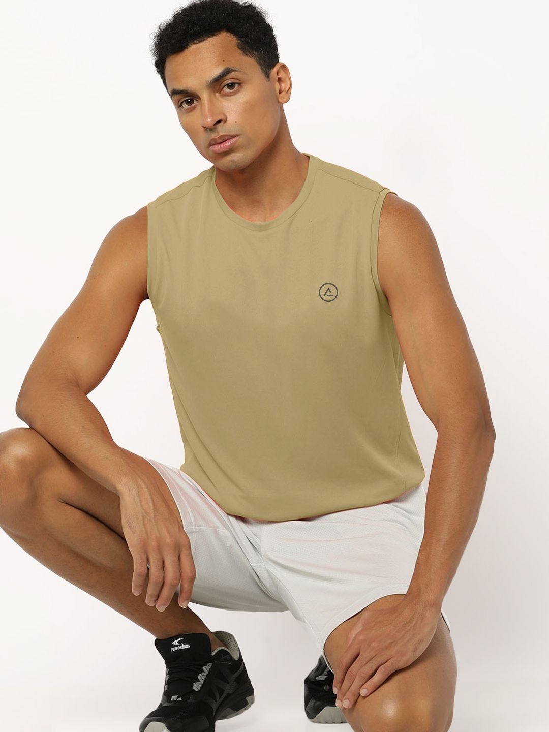 Men Beige Solid Sleeveless Sports T-shirt