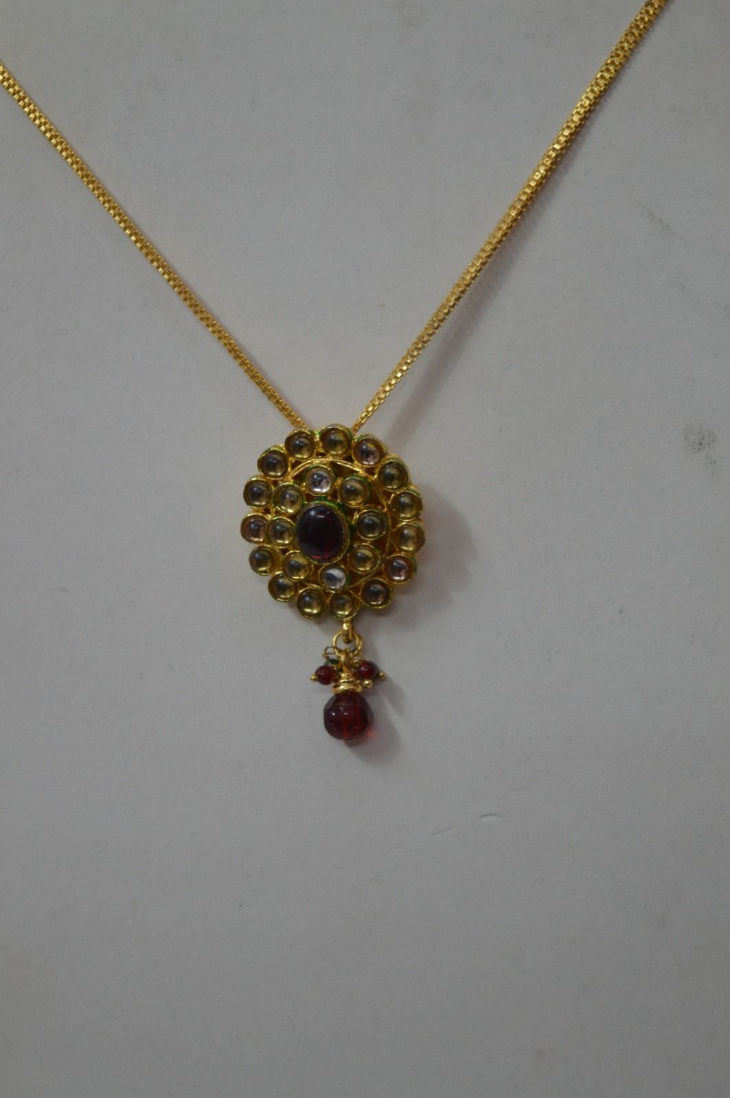 Kundan and Red Stone Pendant Set