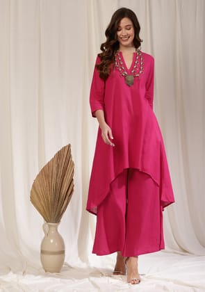 Fuchsia Asymmetric Cotton Kurta Paired with Pants Fuchsia Asymmetric Cotton Kurta Paired with Pants