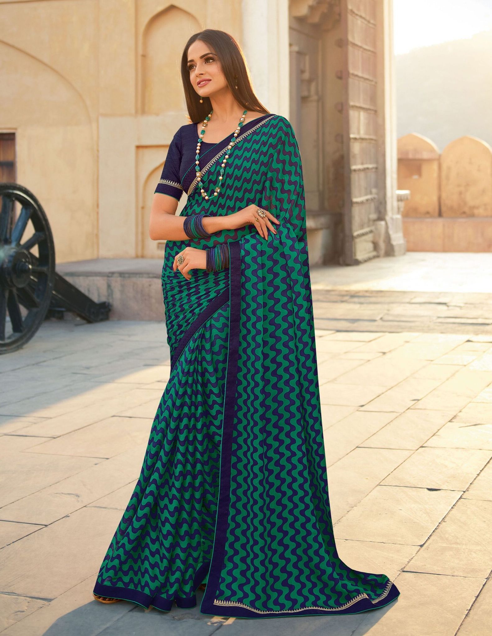 Mutlicolor Elegant Moss Chiffon Fabric Printed Saree With Fancy Thread Work Border And Blue Fancy Thread Work Blouse Material.
