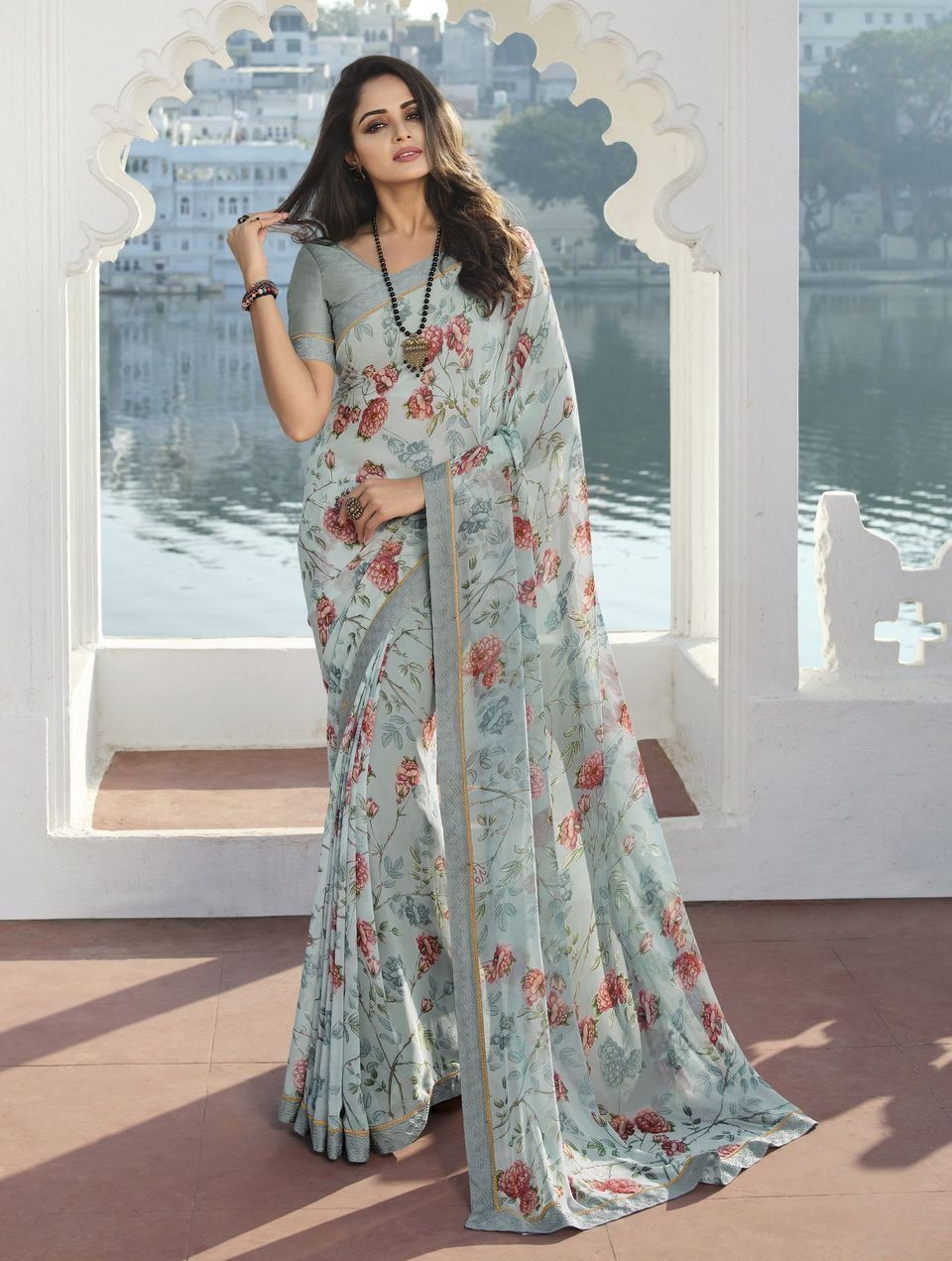 Blue Color Floral Print Georgette Fabric Printed Saree With Fancy Attached Work Border And Blue Fancy Blouse Material