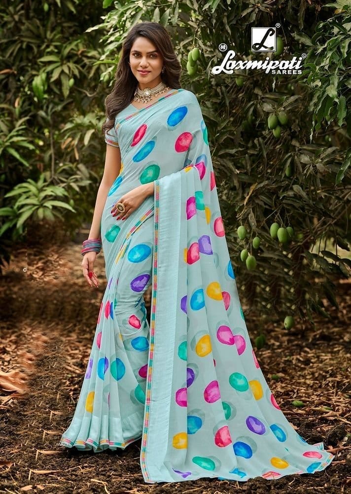 Blue Color Georgette Saree With Fancy Border And Blouse Piece