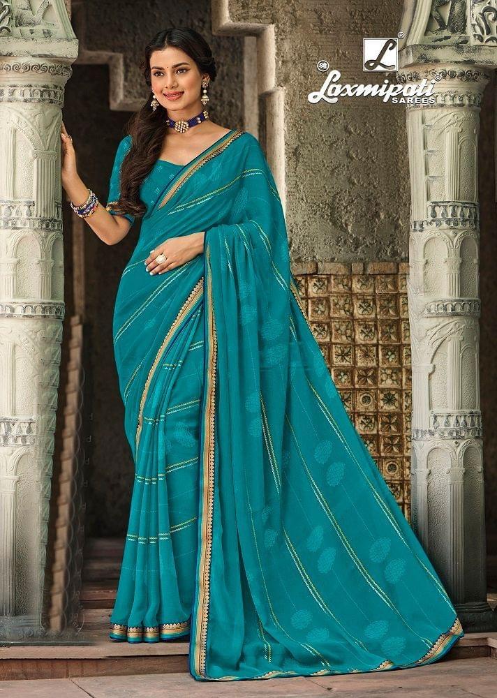 Blue Color Foil Print Georgette Saree With Fancy Border And Fancy Blouse Piece