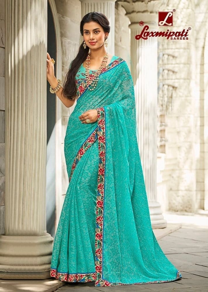 Turquoise Color Chiffon Saree With Fancy Border And Fancy Blouse Piece