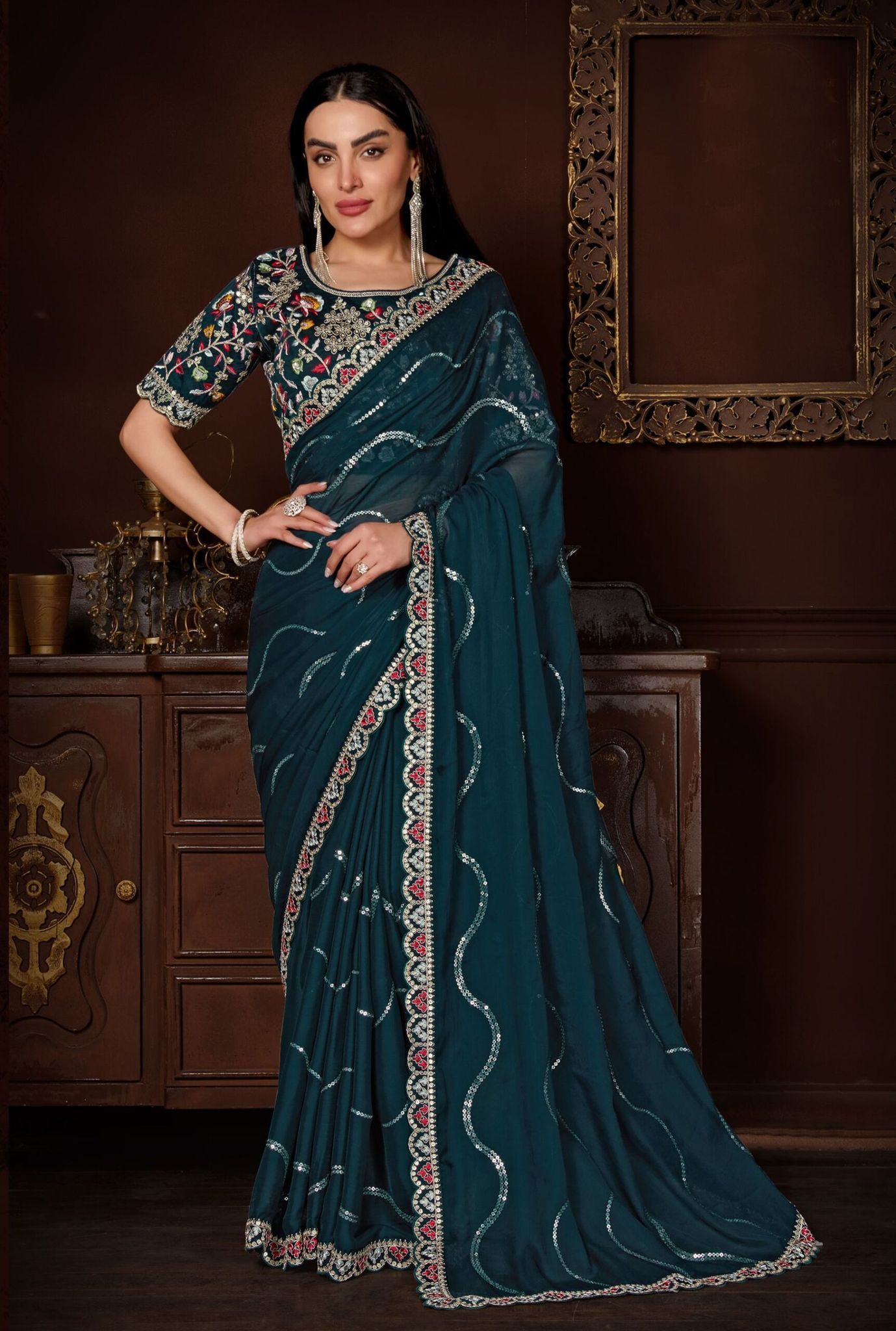Teal Color Chiffon Fabric Saree with sequence work and Stone work on the Border and Embroidered Blouse