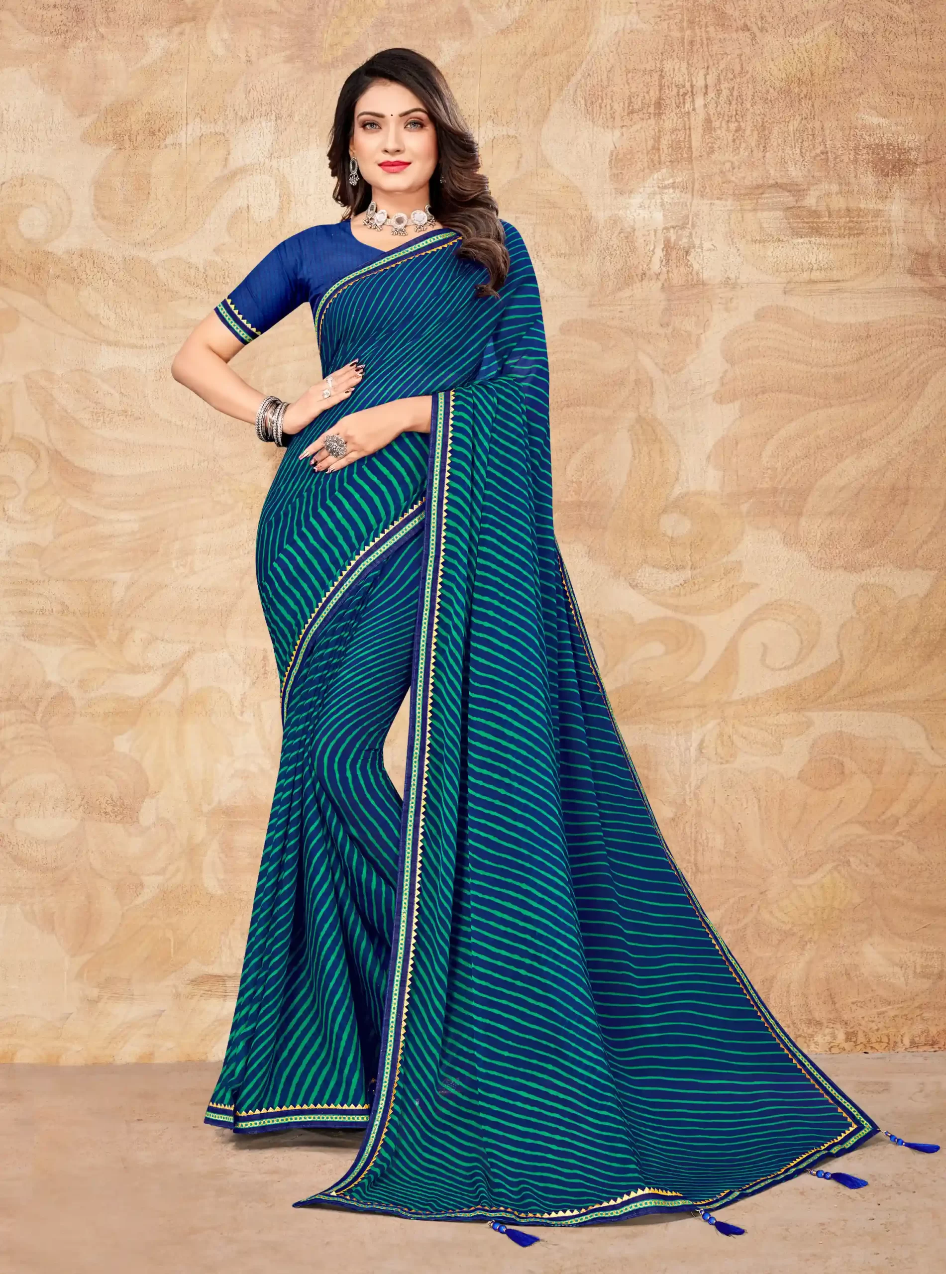 Teal Chiffon Printed Saree With Attached Zari Woven Border Tassal Pallu And Blue Fancy Printed Blouse Material , Daily Wear.