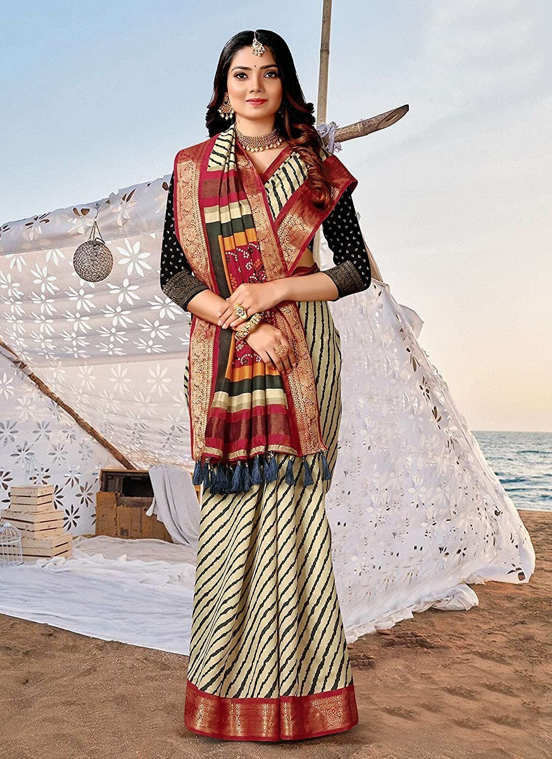 Vipul Beige Gorgeous Party Wear Beautiful Leheriya Print SILK SAREES With Woven Border Tassal Pallu And Black Fancy Woven Blouse Material .
