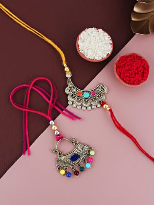 Lucky Jewellery Designer Oxidised Gold Meena Rakhi - Rakshabandhan Rakhee with Lumba Bracelet for Brother/Bhaiya/Bhai/Bhabhi - Multi Color Thread Pack of 2 (105-WECR1-3057-2) Lucky Jewellery Designer Oxidised Gold Meena Rakhi - Rakshabandhan Rakhee with Lumba Bracelet for Brother/Bhaiya/Bhai/Bhabhi - Multi Color Thread Pack of 2 (105-WECR1-3057-2)