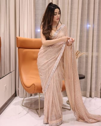 Women's Peach Georgette Embellished Saree with Unstitched Blouse