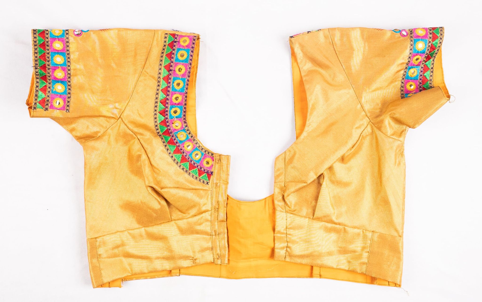 Yellow blouse with mirror work embroidery