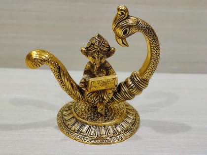 GiftNagri Gold Plated Metal Handicraft New Moon Style Peacock and Ganesha Idol Working On Laptop Hindu God Idols Murti for Return Gift for Students Study Table for Office Table