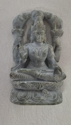 "Exquisite Hand-Carved Stone Sculpture of Hindu Goddess Lakshmi" "Exquisite Hand-Carved Stone Sculpture of Hindu Goddess Lakshmi"