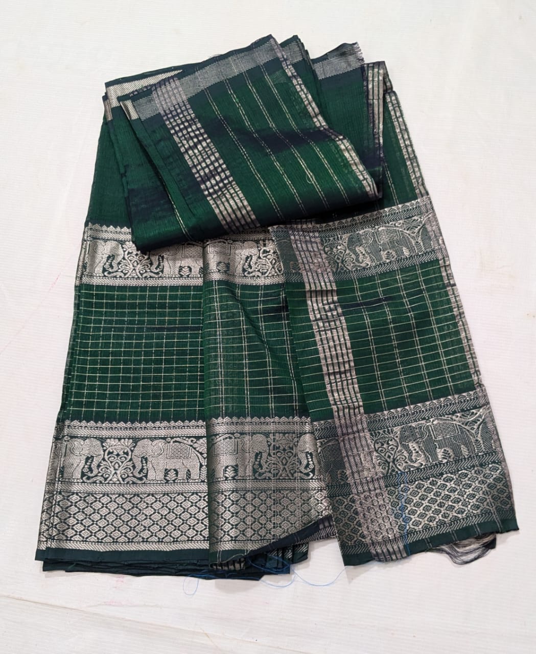 Green and gold zari checks pure cotton saree with elephant motifs