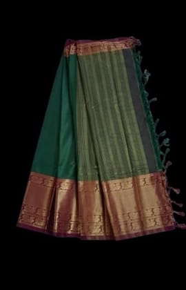 Green and gold zari silk saree with blouse piece Green and gold zari silk saree with blouse piece