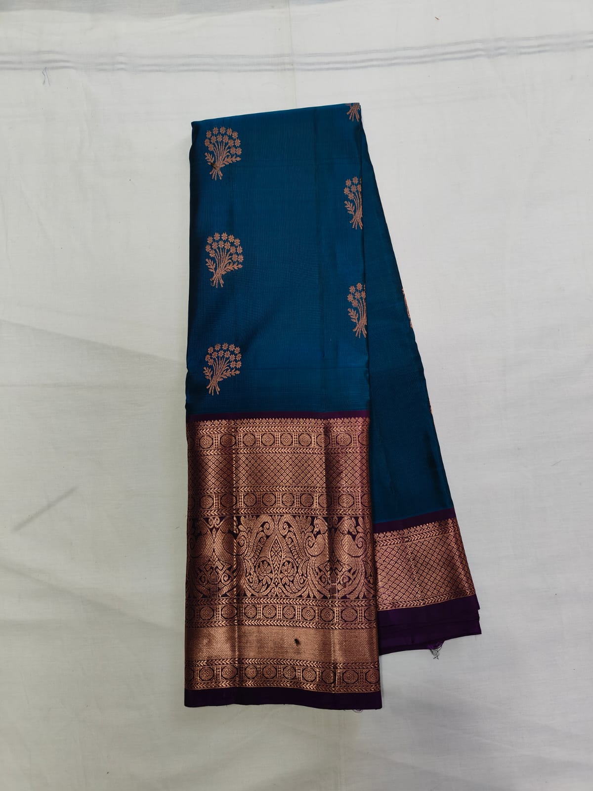 Peacock Blue Kanchipuram Silk Saree With Golden Zari Border