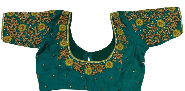 Green blouse with intricate zari embroidery