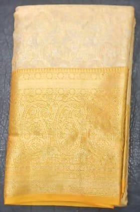 Cream and gold zari woven Kanjivaram silk saree Cream and gold zari woven Kanjivaram silk saree