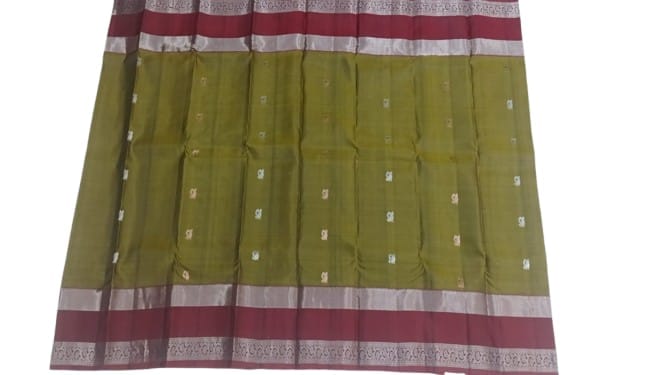 Green and maroon silk cotton saree with zari border