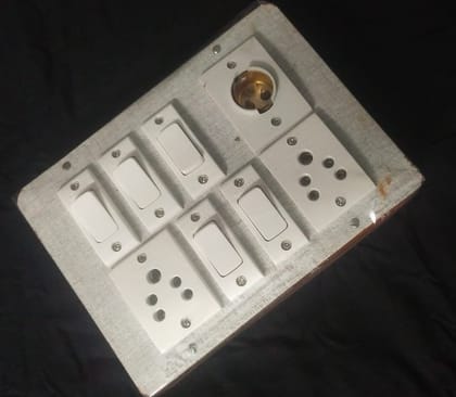 Switchboard with 2 Sockets, 5 Switches and 1 Bulb Holder Switchboard with 2 Sockets, 5 Switches and 1 Bulb Holder