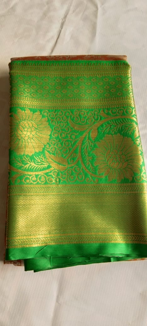 Green and gold zari woven Kanjivaram silk saree with floral motifs 6 meters with combined blouse