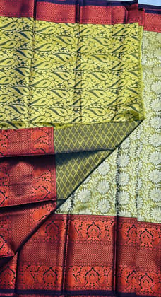 Green and gold zari woven Kanjivaram silk saree with contrast red border Green and gold zari woven Kanjivaram silk saree with contrast red border