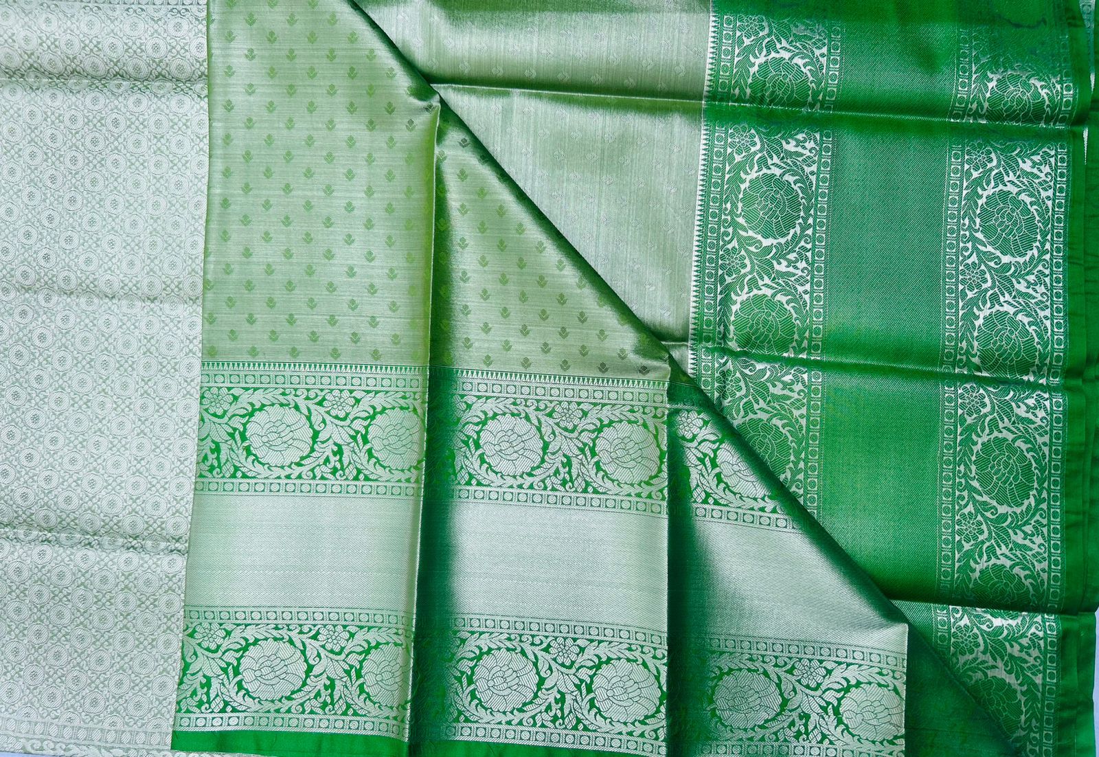 Green Banarasi Silk Saree With Silver Zari Weaving