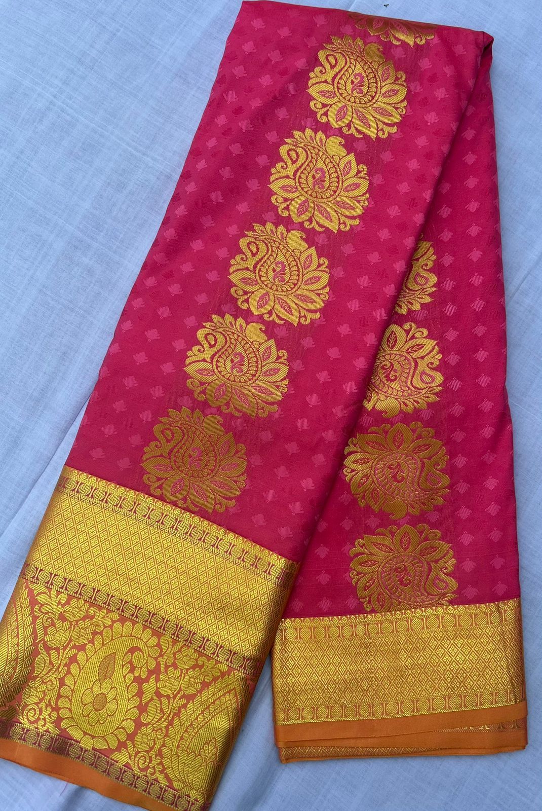 Pink and gold zari woven Kanjivaram silk saree with blouse piece