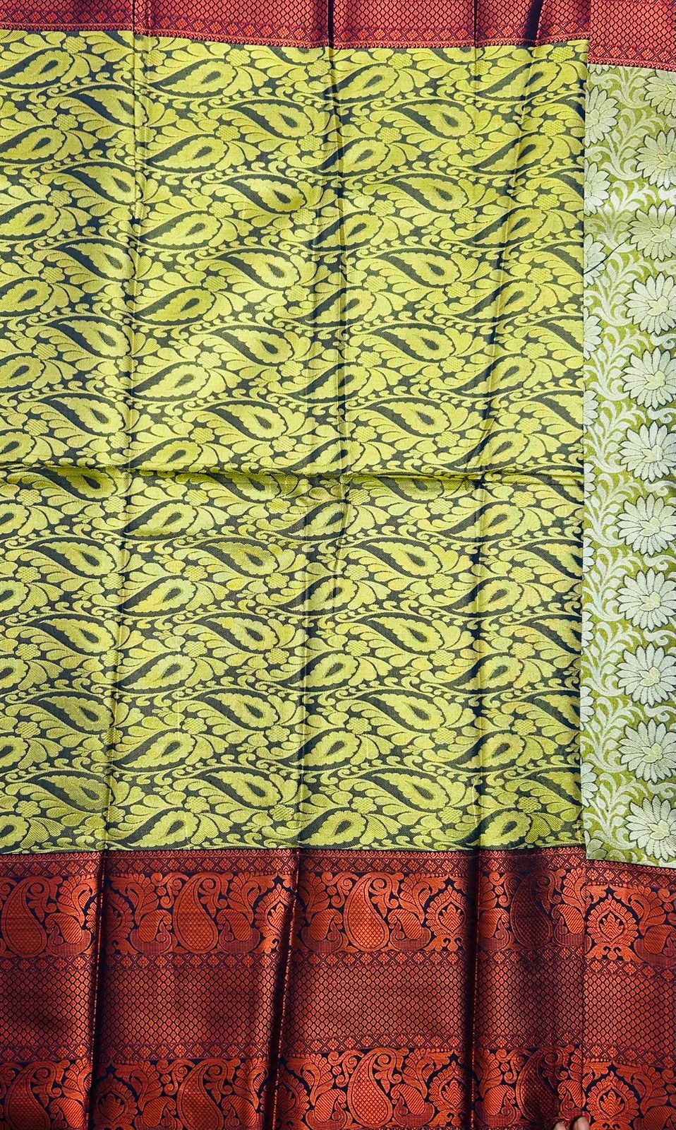  Green and gold zari woven Kanjivaram silk saree with floral motifs