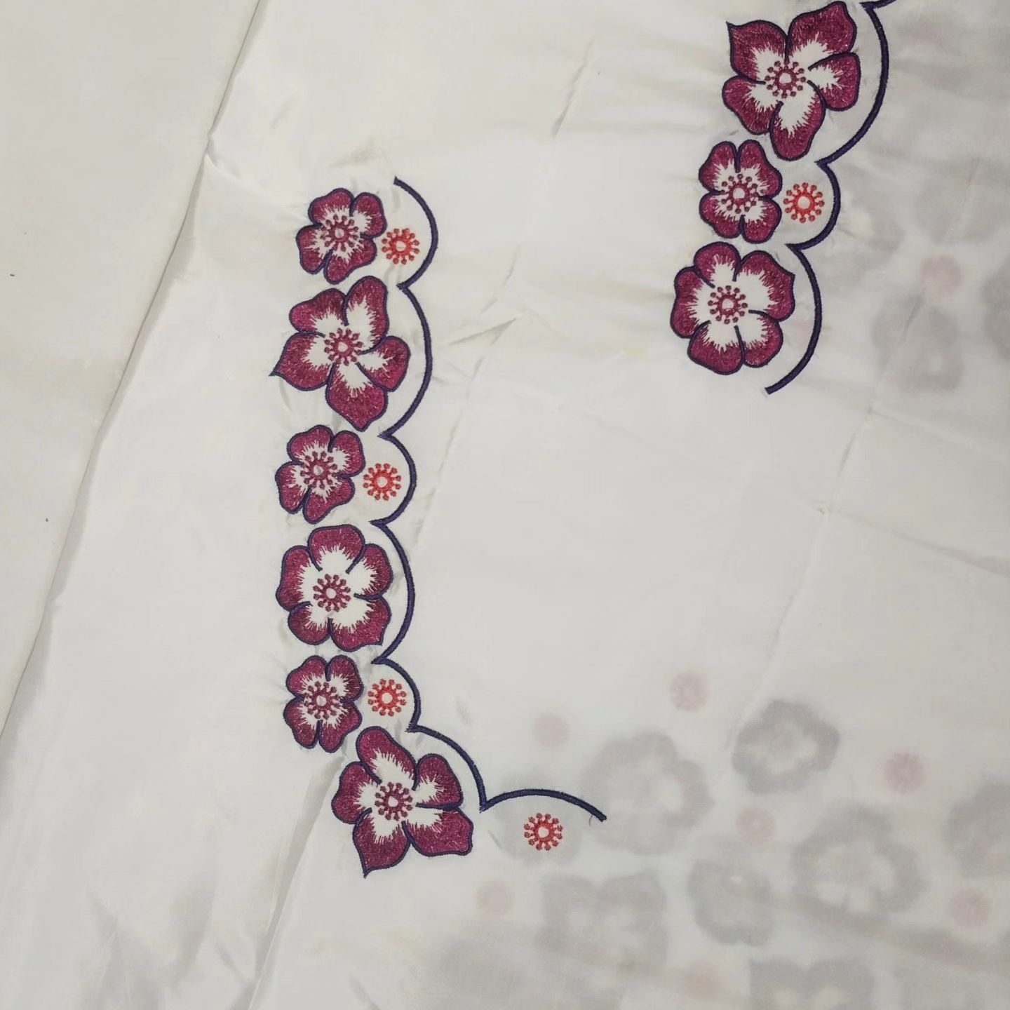 White Off Pattu Fabrick with embroidered pink flowers