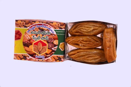 A box of four pieces of Mysore Pak, a traditional Indian sweet A box of four pieces of Mysore Pak, a traditional Indian sweet