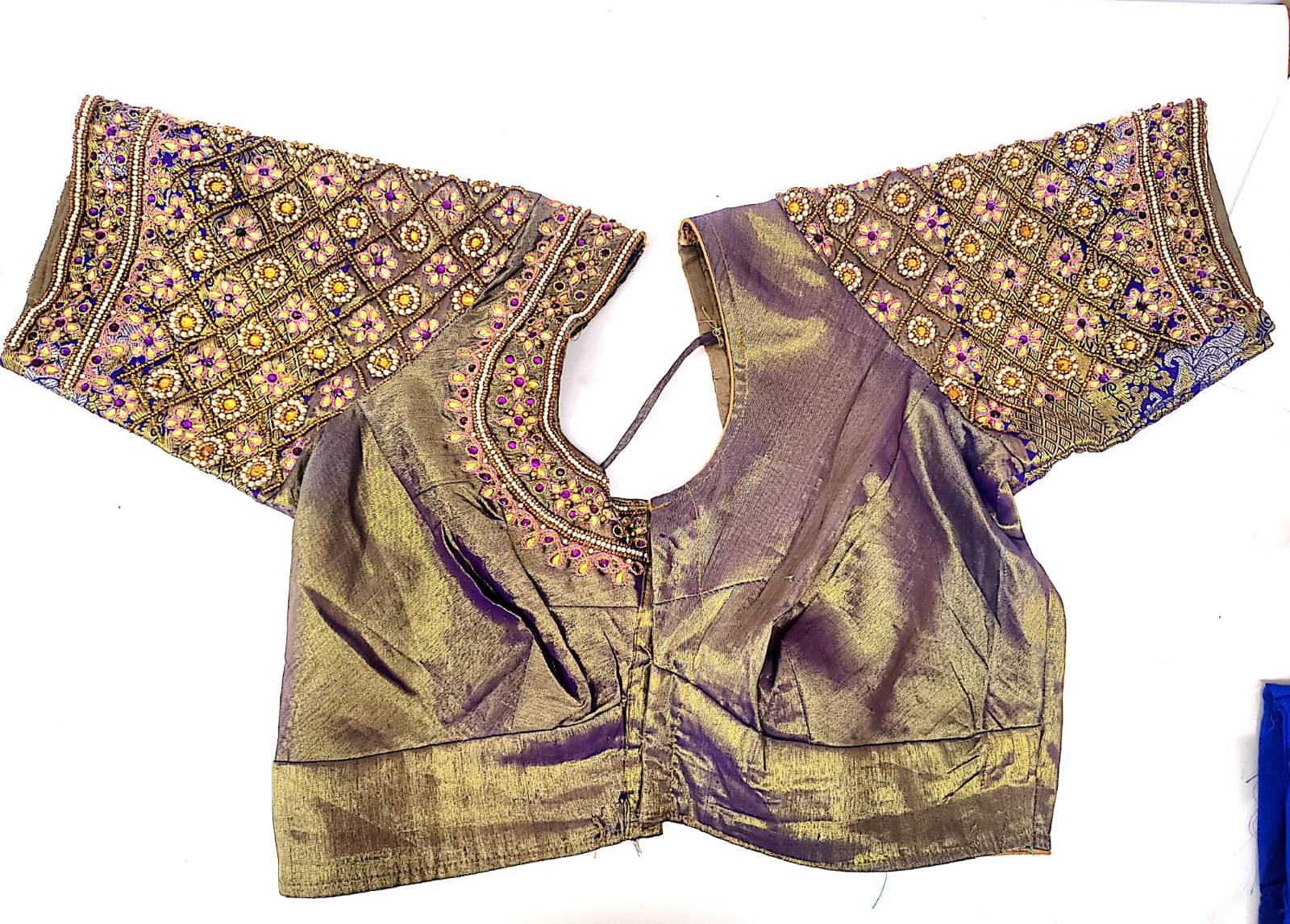 Embroidered boat neck blouse with elbow length sleeves in brown color