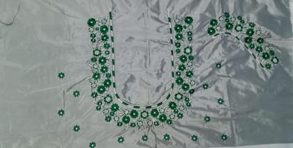 Green and silver embroidered blouse neck design Green and silver embroidered blouse neck design