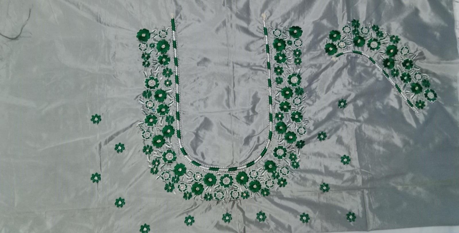 Green and silver embroidered blouse neck design