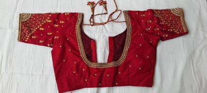 Red zari embroidered work blouse Red zari embroidered work blouse