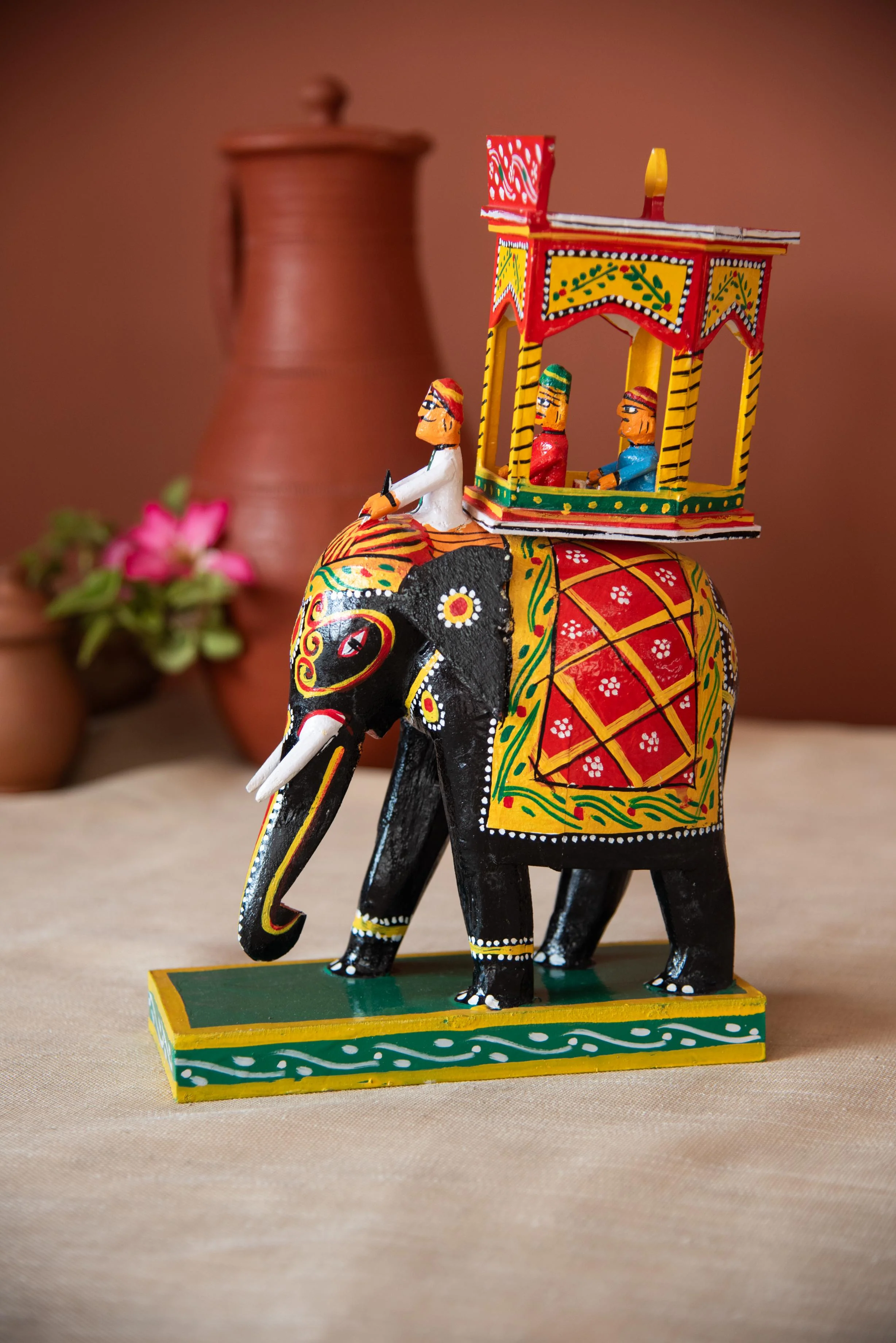 Handcrafted Wooden Elephant with intricate detailing, perfect for Home Decor and Gifting
