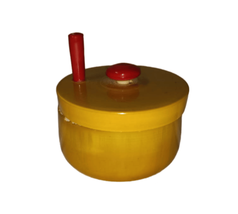 Wooden pestle and mortar set with red accents