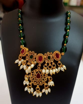 oxidized gold plated traditional necklace set with green beads and pearls oxidized gold plated traditional necklace set with green beads and pearls