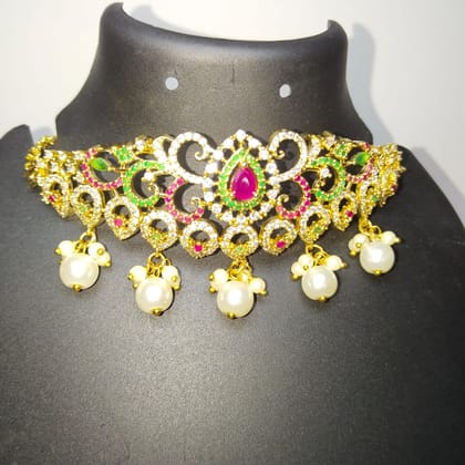 Gold-plated Kundan and Pearl Choker Necklace Set with Green Stones and Pearls Gold-plated Kundan and Pearl Choker Necklace Set with Green Stones and Pearls