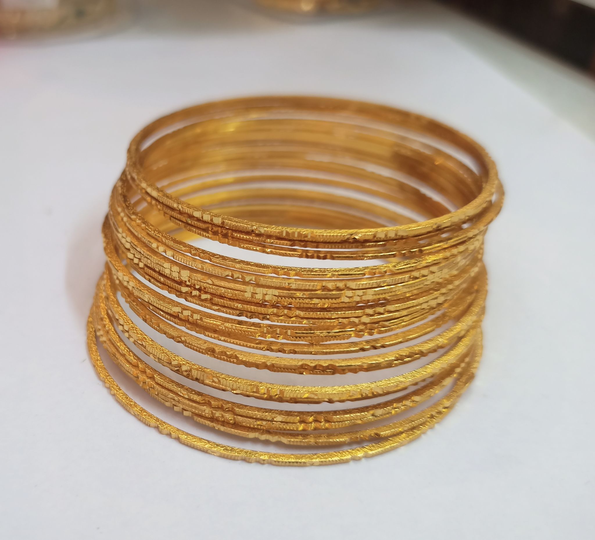Gold Plated Glossy Finish Designer Bangles Set For Women (Pack of 12)