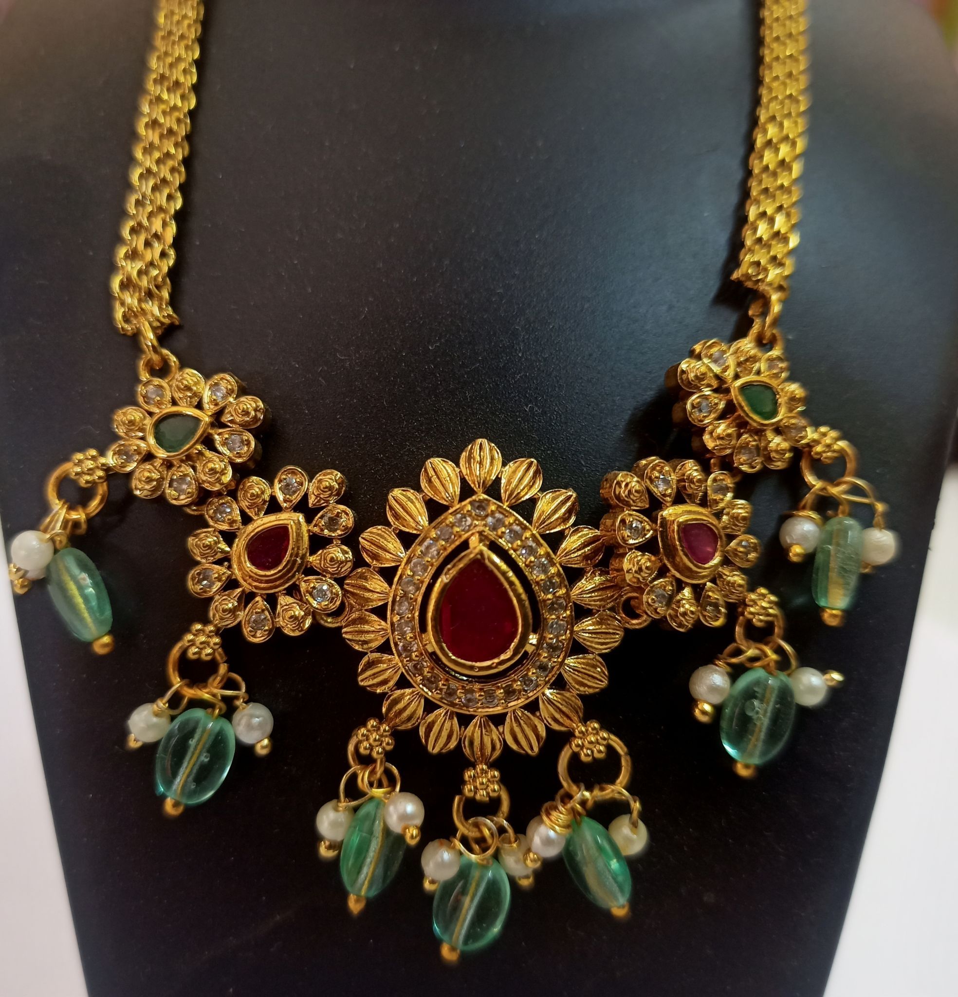 Gold-plated traditional Indian necklace set with kundan and pearl drops