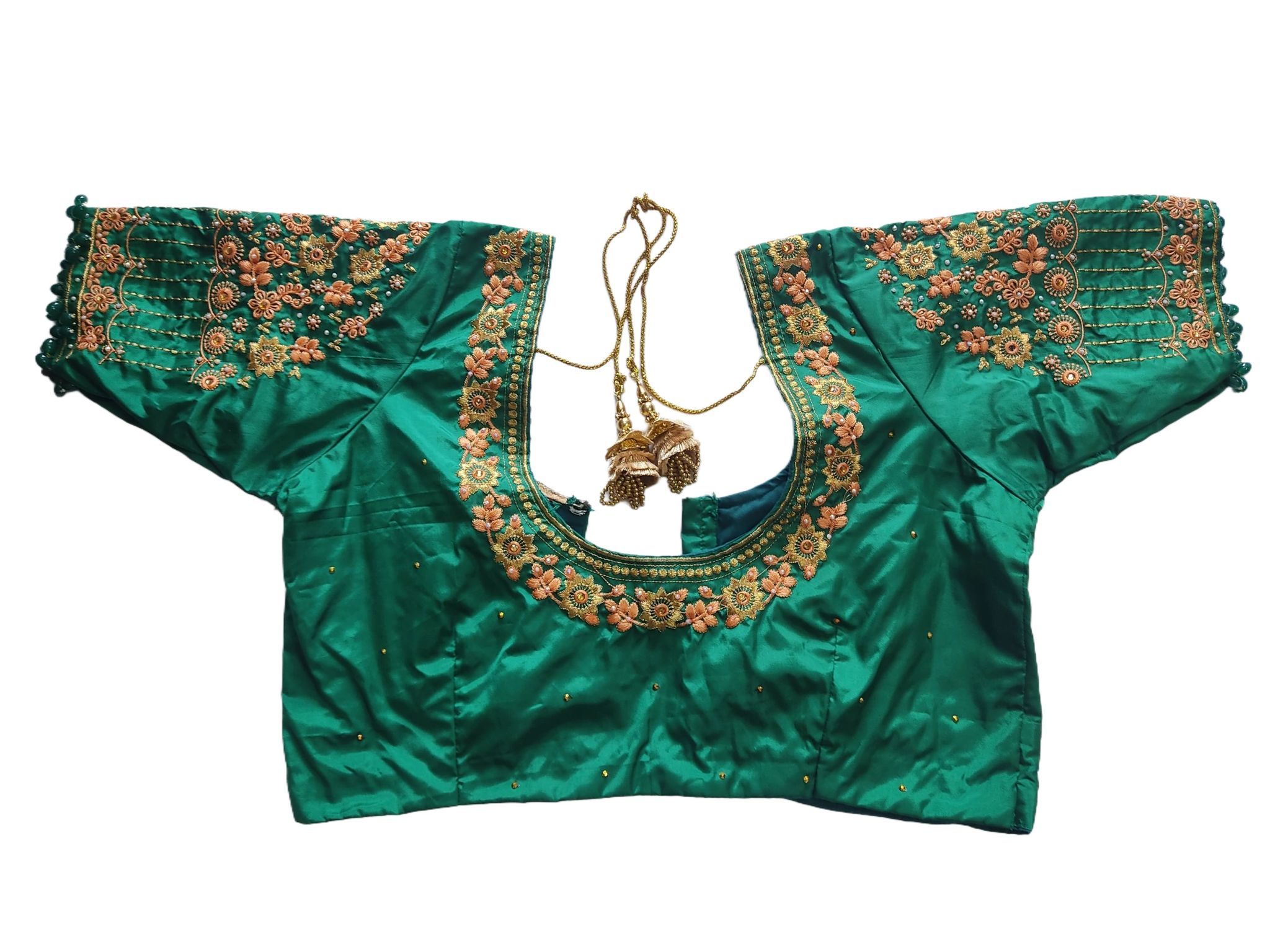 Green blouse with intricate zari embroidery and mirror work