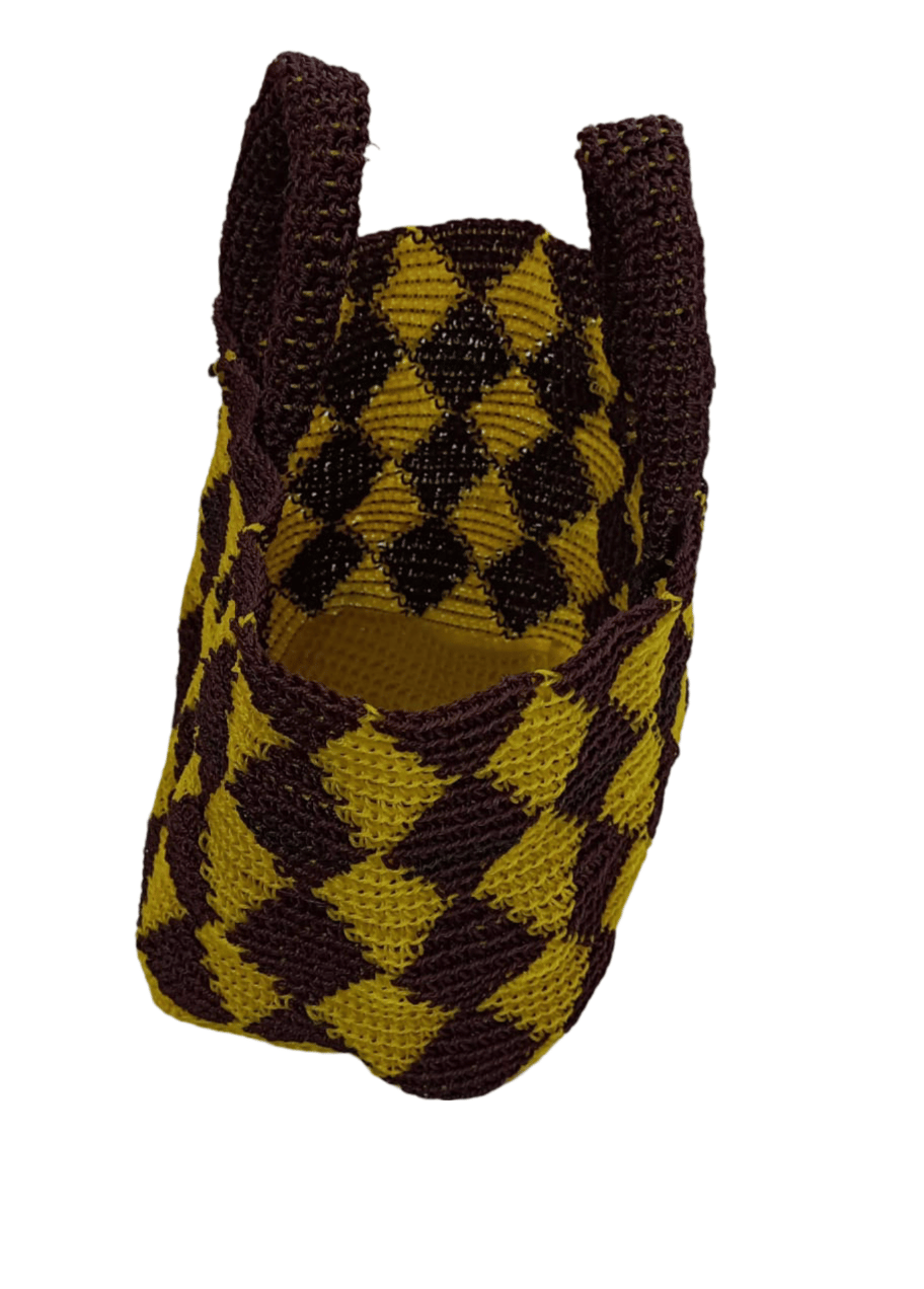 "Handmade raffia basket with a unique geometric pattern, perfect for storing small items or as a gift"