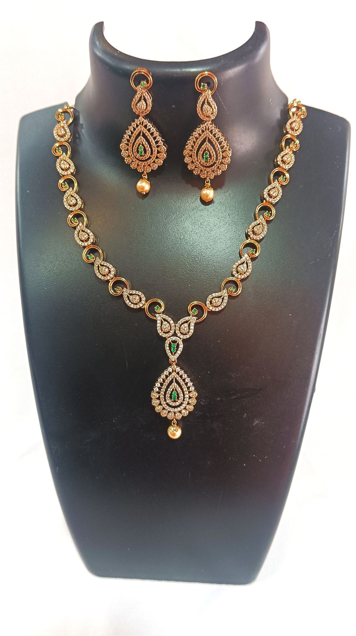 Gold-plated Kundan and Pearl Necklace Set with Green Stones