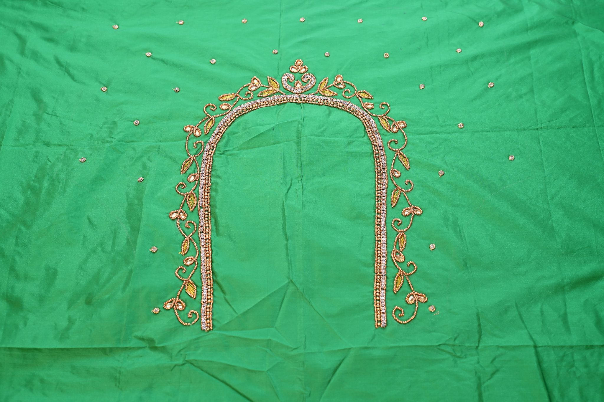 Green blouse with intricate zari and stone embroidery