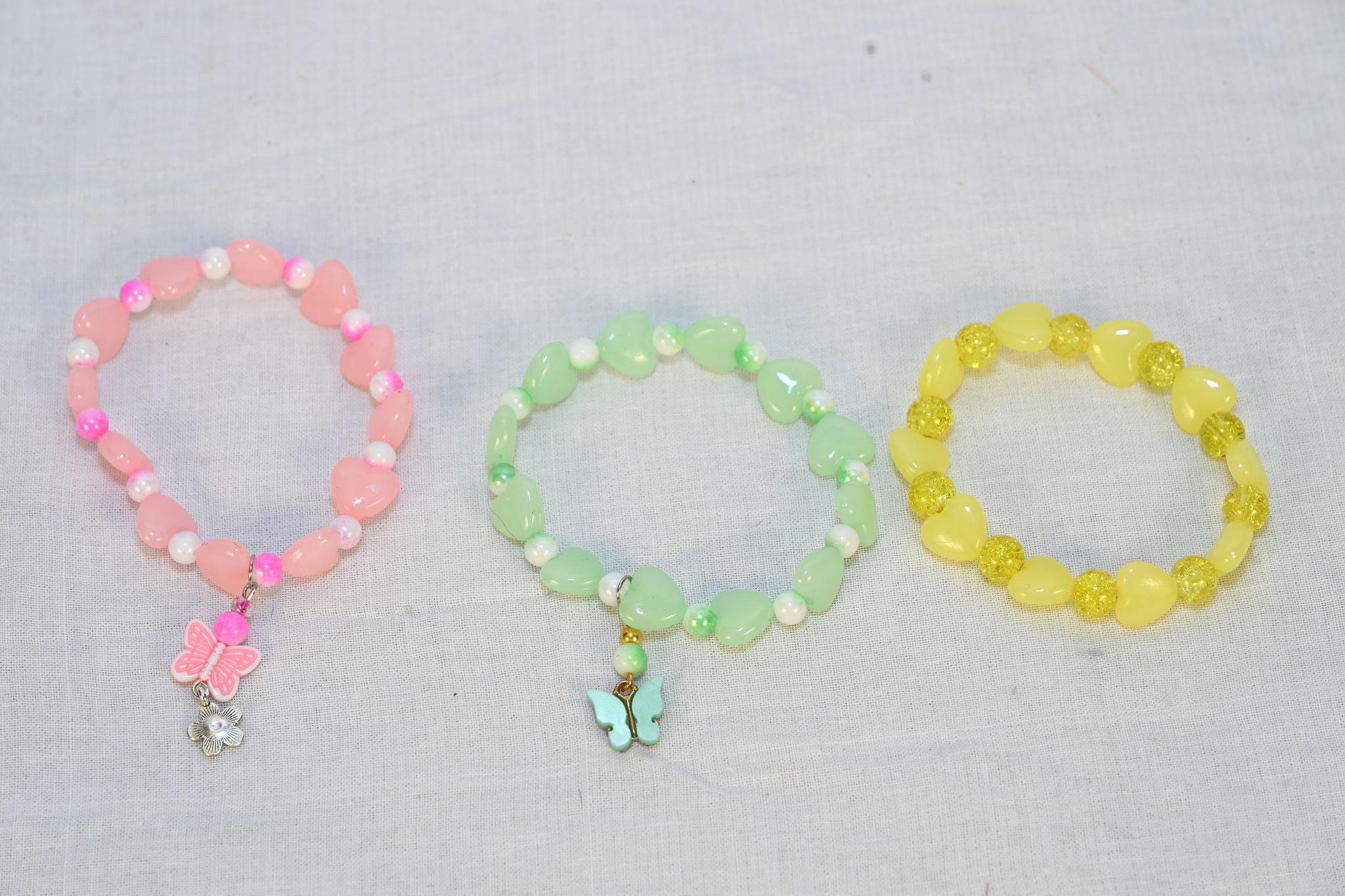 Pink, Green and Yellow Beaded Charm Bracelets