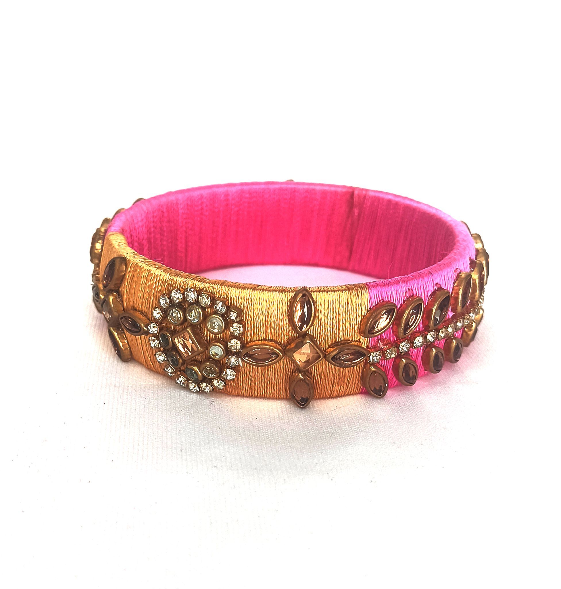 Pink and gold silk thread bangle with kundan stones