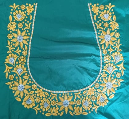 Green blouse with intricate golden embroidery